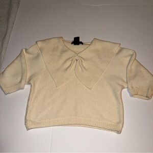 Chic Cream Women's Sweater with Bow Accent